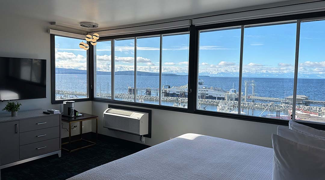 Interior of Waterways, A Boutique Hotel, featuring a king bed and ocean views