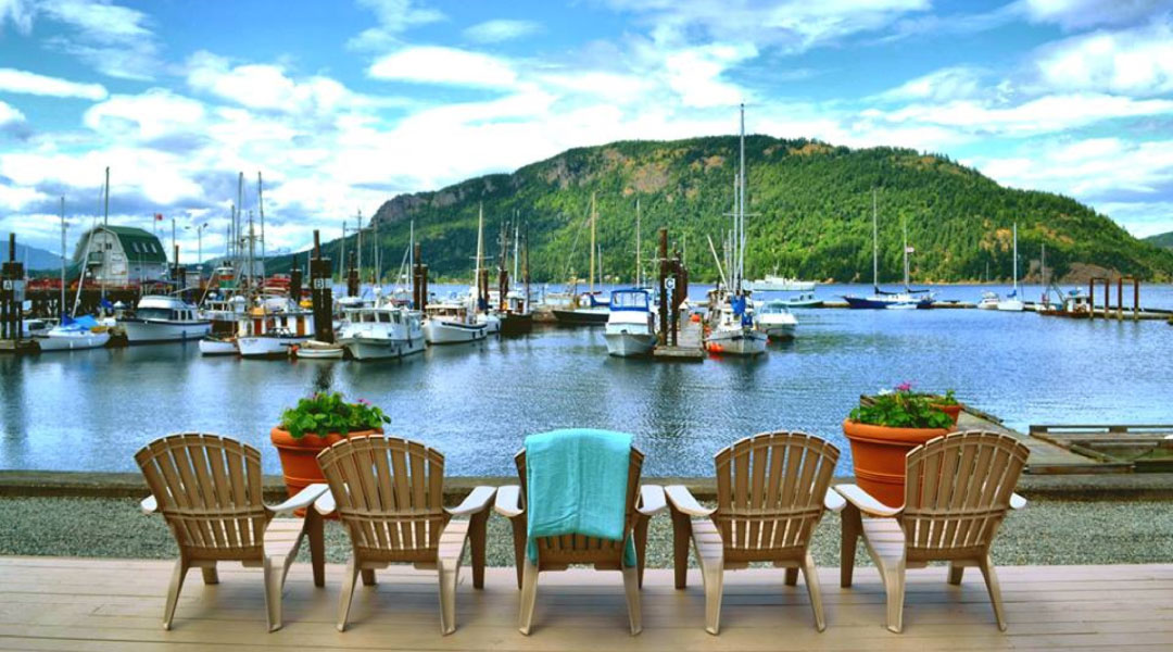 Chairs on the dock at Oceanfront Suites in Cowichan Bay Chairs on the dock at Oceanfront Suites in Cowichan Bay