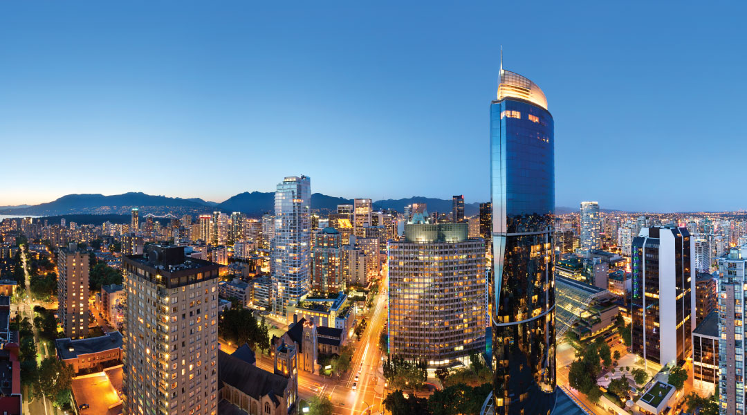 Aerial view of Sheraton Vancouver Wall Centre and the city at night Aerial view of Sheraton Vancouver Wall Centre and the city at night