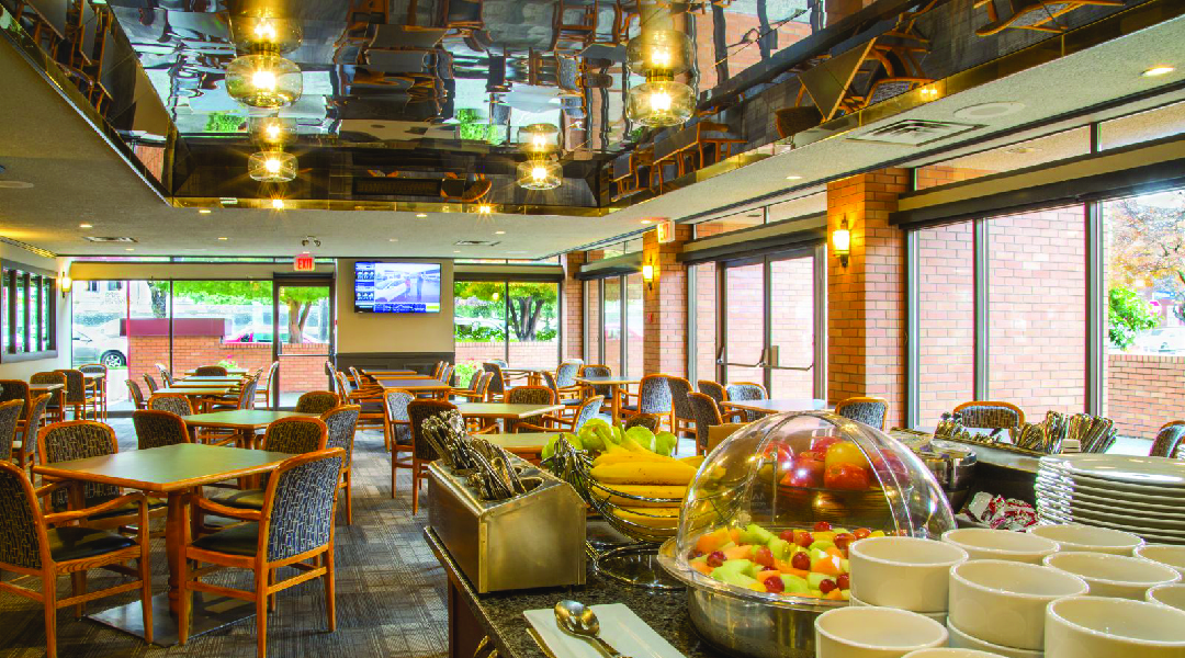 Breakfast area at the Embassy Inn with reflective ceiling