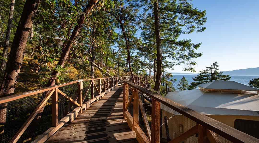 Outdoor boardwalk between tenthouse suites at Rockwater Secret Cove Resort