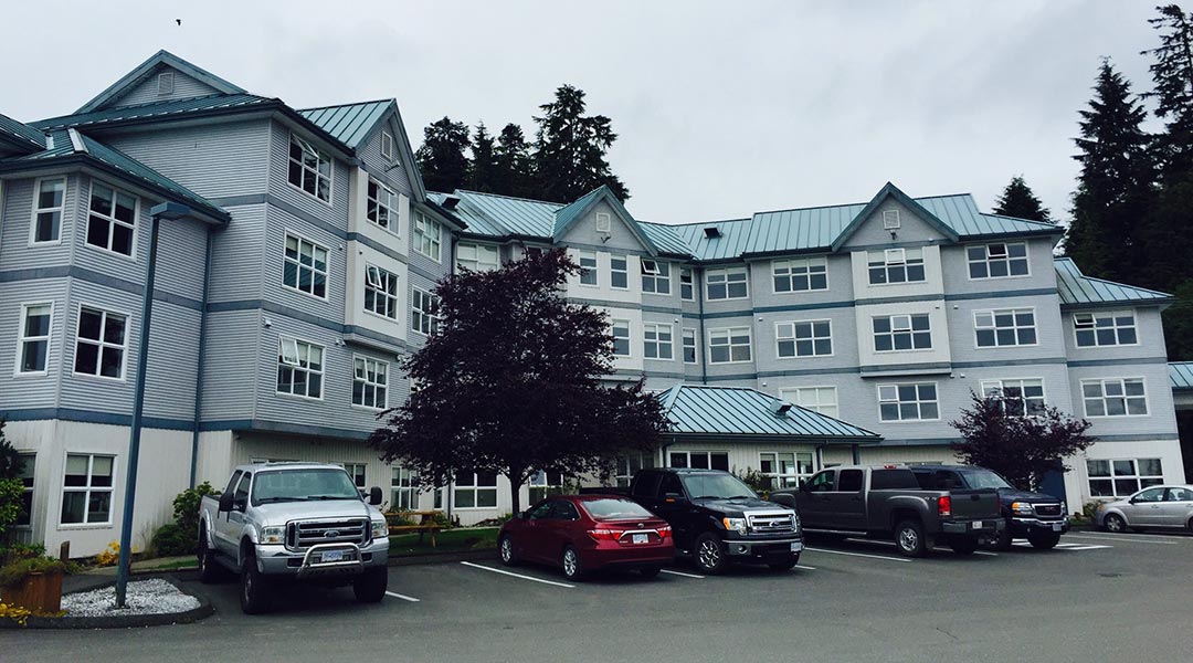 Exterior of the Quarterdeck Resort and Marina in Port Hardy and parking lot Exterior of the Quarterdeck Resort and Marina in Port Hardy and parking lot