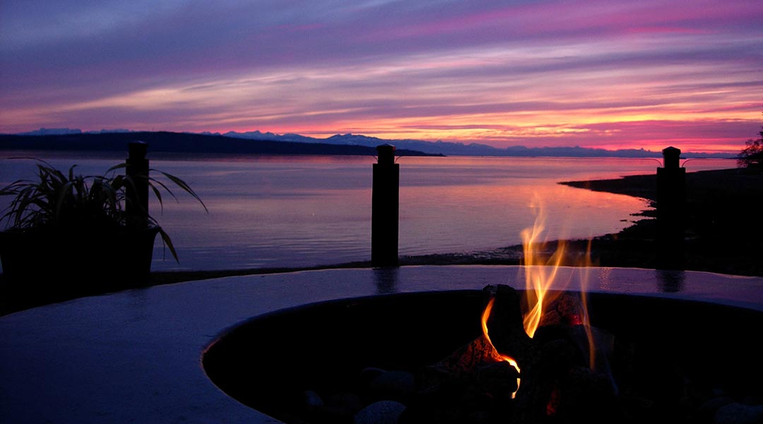 Firepit with an oceanview at dusk at the Beach Gardens Resort and Marina in Powell River on the Sunshine Coast Firepit with an oceanview at dusk at the Beach Gardens Resort and Marina in Powell River on the Sunshine Coast