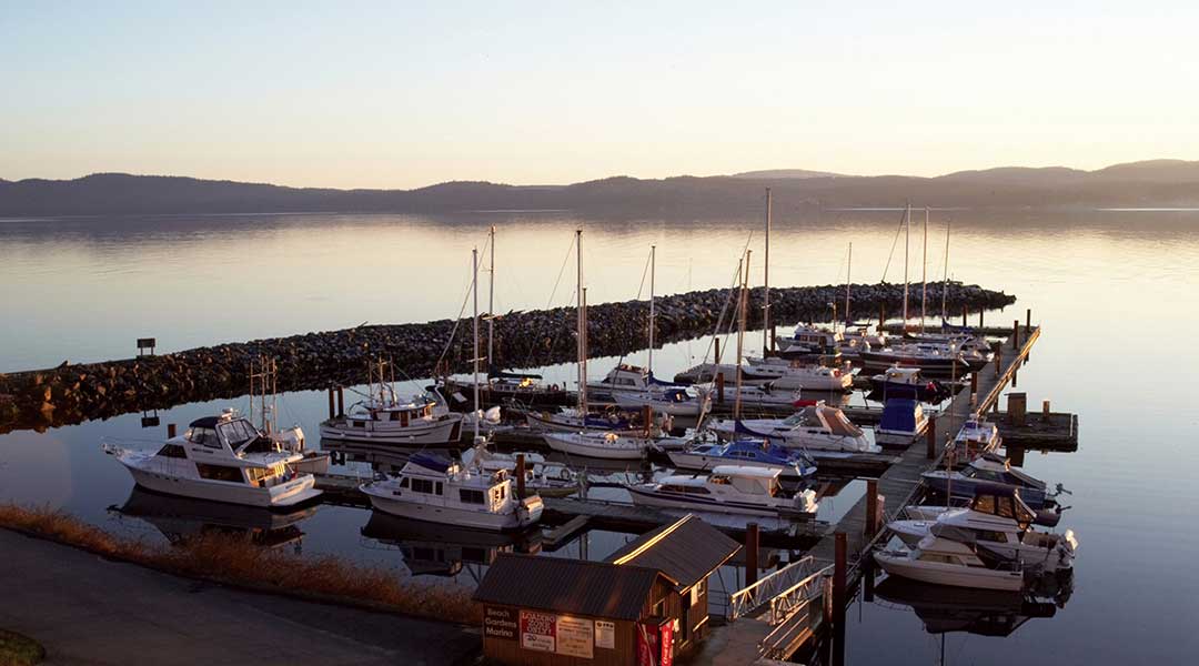 Boats docked at the Beach Gardens Resort and Marina in Powell River on the Sunshine Coast at sunset Boats docked at the Beach Gardens Resort and Marina in Powell River on the Sunshine Coast at sunset