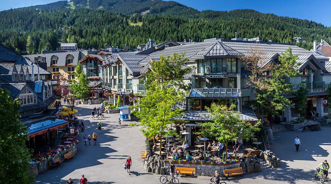 An aerial view of the exterior entrance and building to the Crystal Lodge and Suites in Whistler Village An aerial view of the exterior entrance and building to the Crystal Lodge and Suites in Whistler Village
