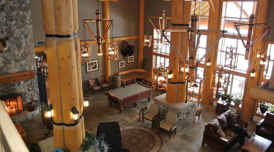The interior lobby with a seating area and pool table at the Coast Hillcrest Hotel in Revelstoke The interior lobby with a seating area and pool table at the Coast Hillcrest Hotel in Revelstoke