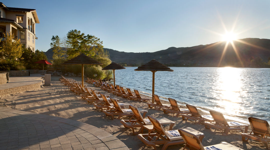Chairs along the beach at Walnut Beach Resort in Osoyoos Okanagan Chairs along the beach at Walnut Beach Resort in Osoyoos Okanagan