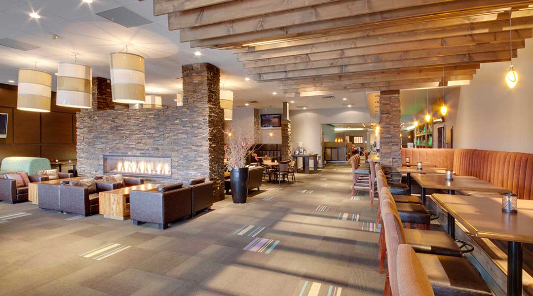 The Prestons Lounge with seating area and dining tables at the Coast Kamloops Hotel and Conference Centre in Thompson Okanagan The Prestons Lounge with seating area and dining tables at the Coast Kamloops Hotel and Conference Centre in Thompson Okanagan