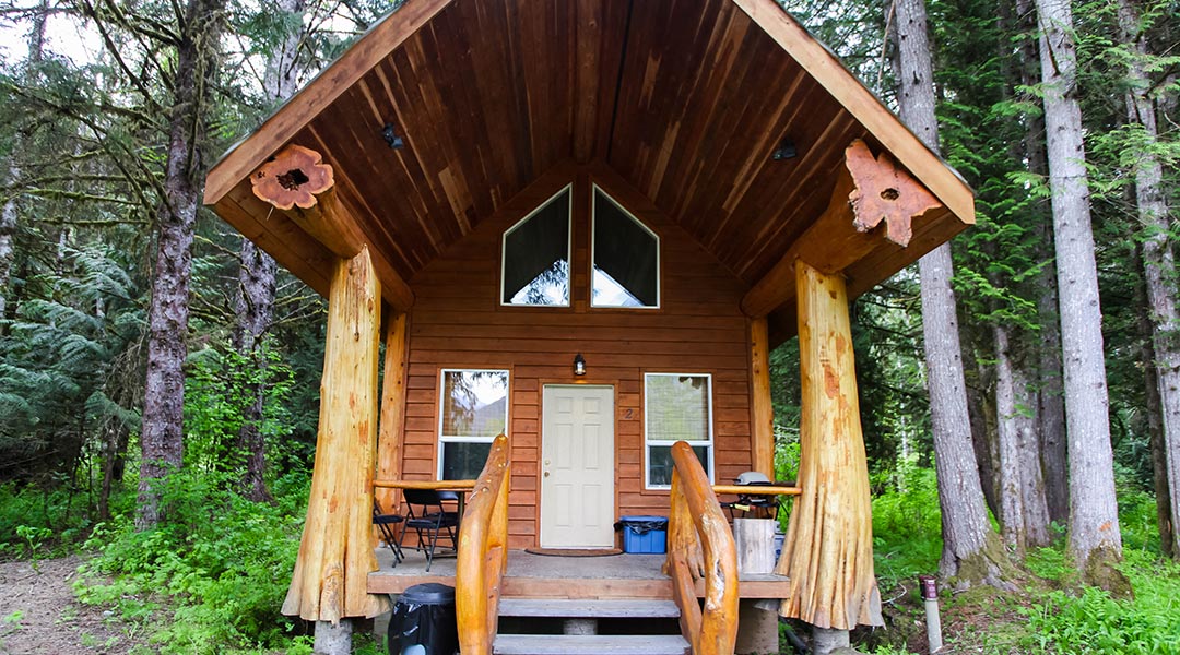 Exterior entrance and balcony of the Chalet One-Black Bear at the Bella Coola Grizzly Tours in the Cariboo Chilcotin Coast Exterior entrance and balcony of the Chalet One-Black Bear at the Bella Coola Grizzly Tours in the Cariboo Chilcotin Coast