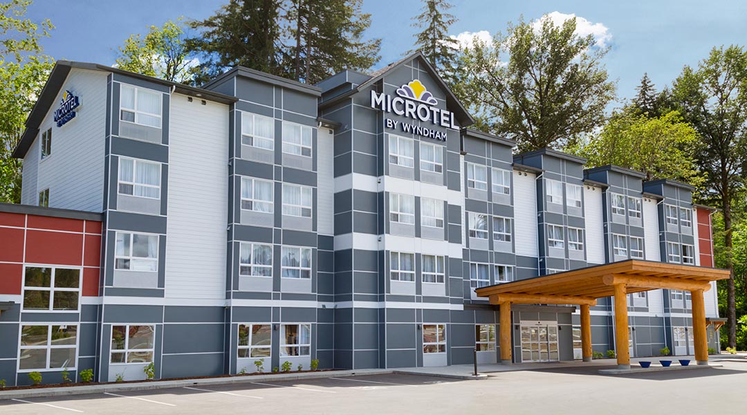 The exterior building and entrance of the Microtel Inn and Suites by Wyndham Ladysmith Oyster Bay The exterior building and entrance of the Microtel Inn and Suites by Wyndham Ladysmith Oyster Bay