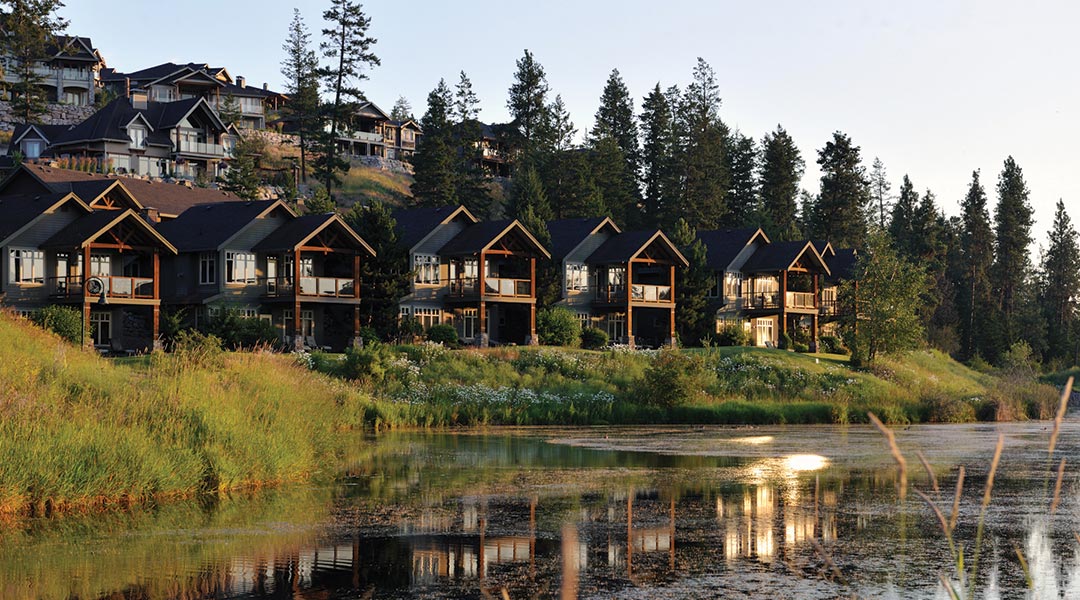 Exterior of Falcon Point Villas with green grass out front at Predator Ridge Resort in Vernon BC Exterior of Falcon Point Villas with green grass out front at Predator Ridge Resort in Vernon BC