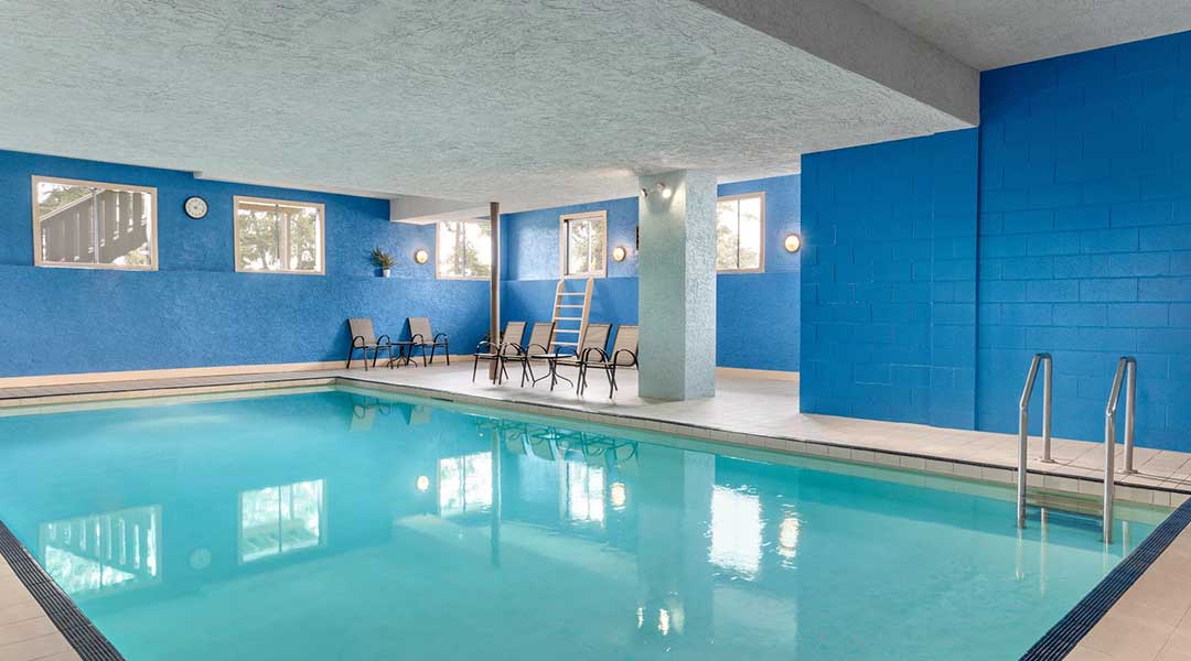 The indoor swimming pool at the Days Inn by Wyndham Victoria Uptown