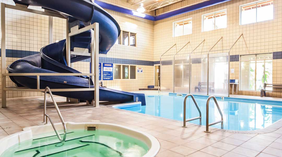 The indoor pool and waterslide at the Coast Osoyoos Beach Hotel in Thompson Okanagan The indoor pool and waterslide at the Coast Osoyoos Beach Hotel in Thompson Okanagan