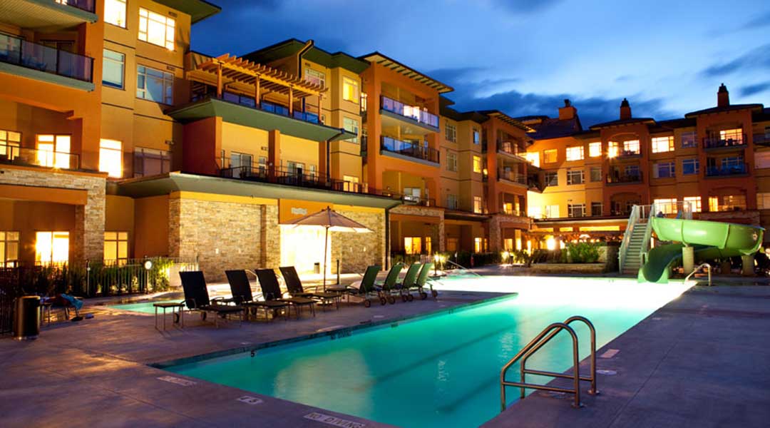 Pool in the evening with lights brightening the pool at Watermark Beach Resort in Osoyoos Okanagan Pool in the evening with lights brightening the pool at Watermark Beach Resort in Osoyoos Okanagan