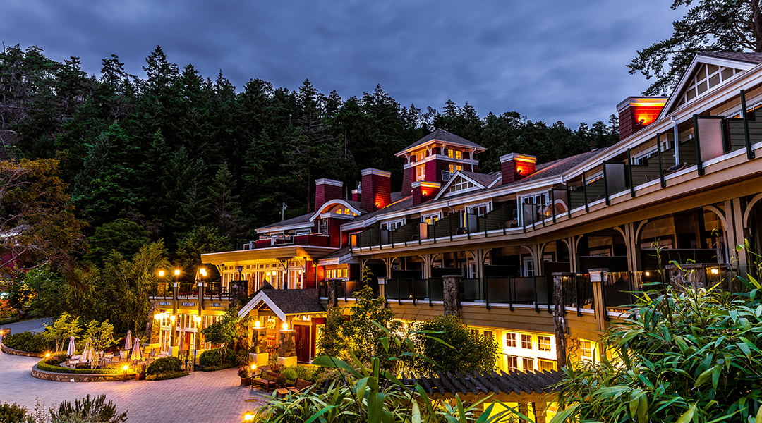 Exterior of Poets Cove Resort and Spa at night with evening lights on Pender Island Exterior of Poets Cove Resort and Spa at night with evening lights on Pender Island