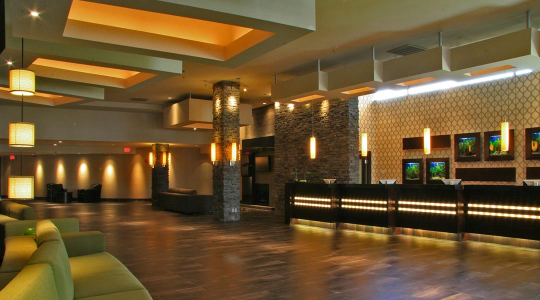 The front desk in the lobby area at the Sandman Signature Vancouver Airport Hotel and Resort in Richmond The front desk in the lobby area at the Sandman Signature Vancouver Airport Hotel and Resort in Richmond